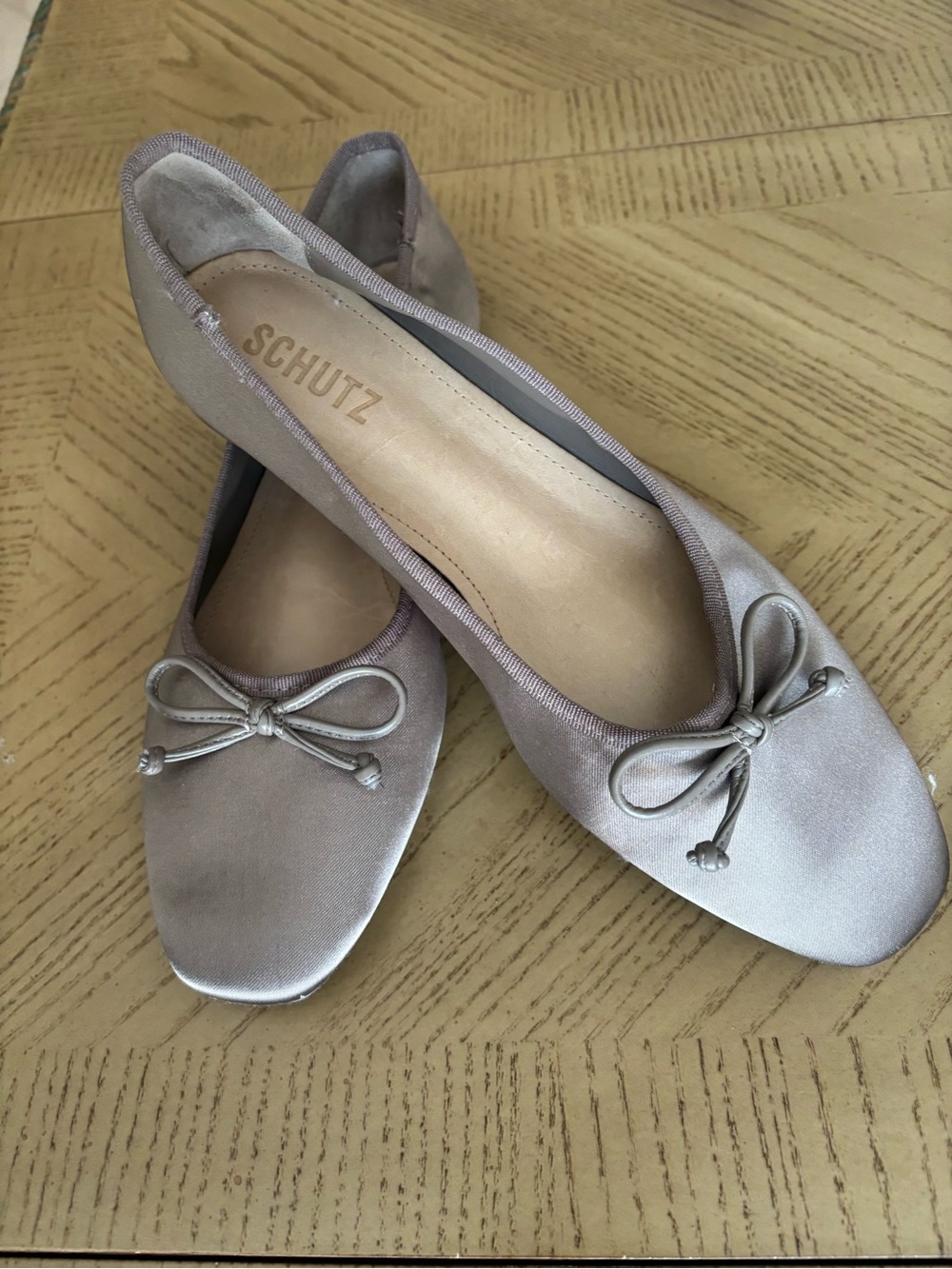 SCHUTZ Silver Satin Ballet Flats with Bow Accent